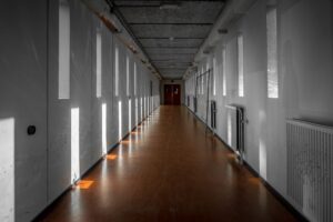wide shot white hallway with reflections light from windows Мифы о психиатрической больнице О.Ц.П.З. Актобе